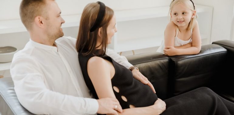 A loving family shares a tender moment, embracing joy and connection.